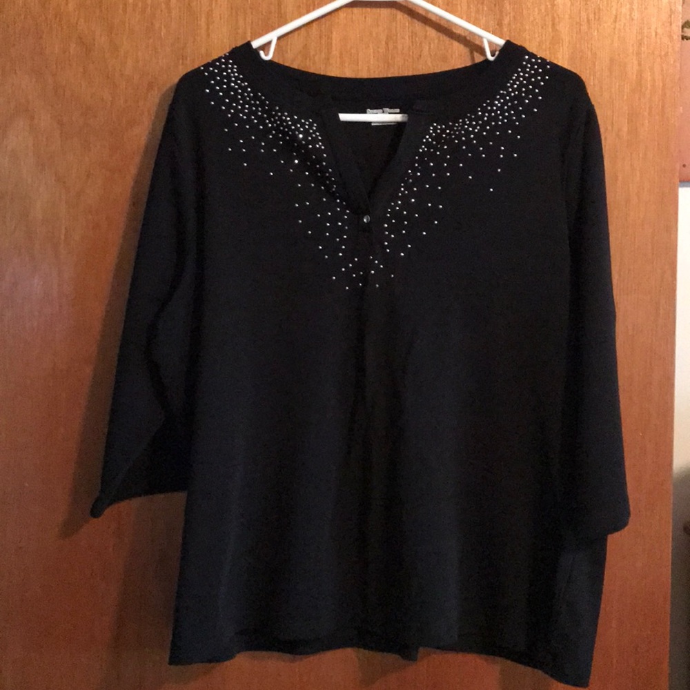 Black 3/4 sleeve top. Silver stud decorations